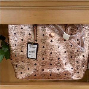 Gorgeous MCM Champagne gold tote bag never used